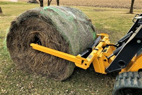 round bale unroller for skid steer|hydraulic round bale hay spinners.